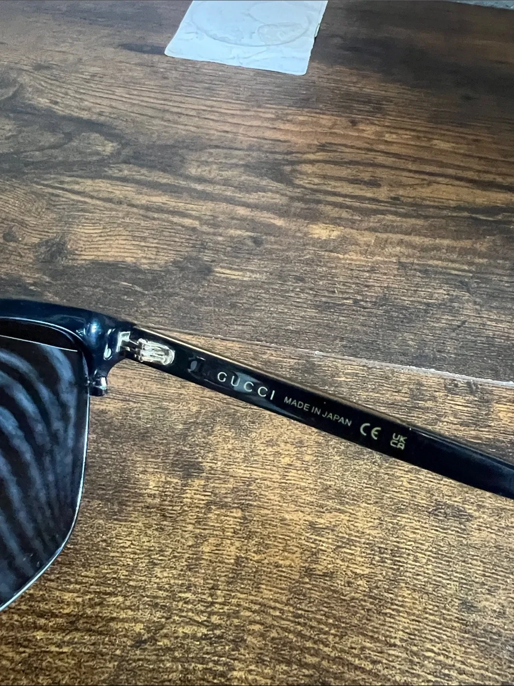 Gucci Black Sunglasses with Gold and Green Accents